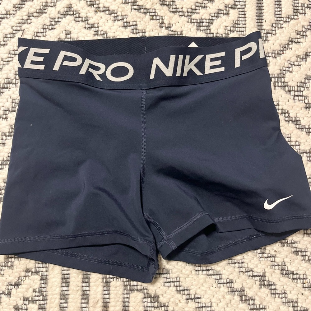 navy blue nike pros